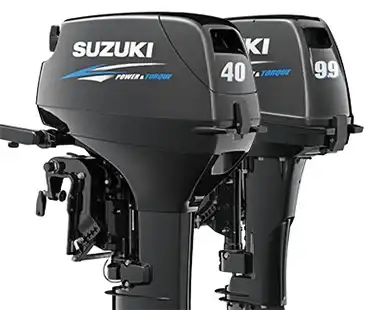 Two black Suzuki outboard motors labeled "40" and "99" with the text "Power & Torque" visible on the side.